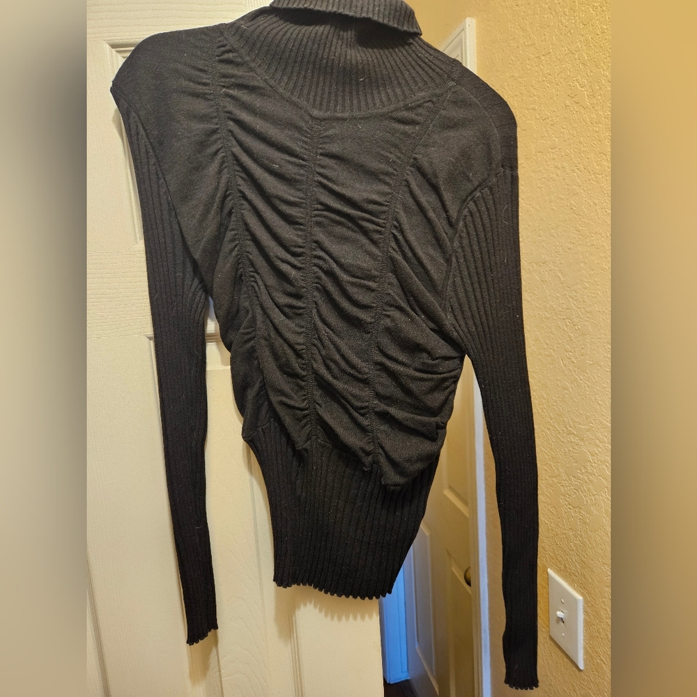 A star turtle neck sweater